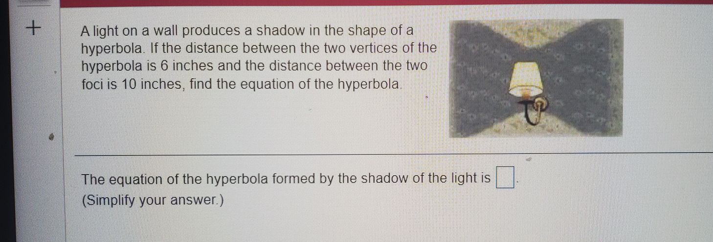 A light on a wall produces a shadow in the shape o...